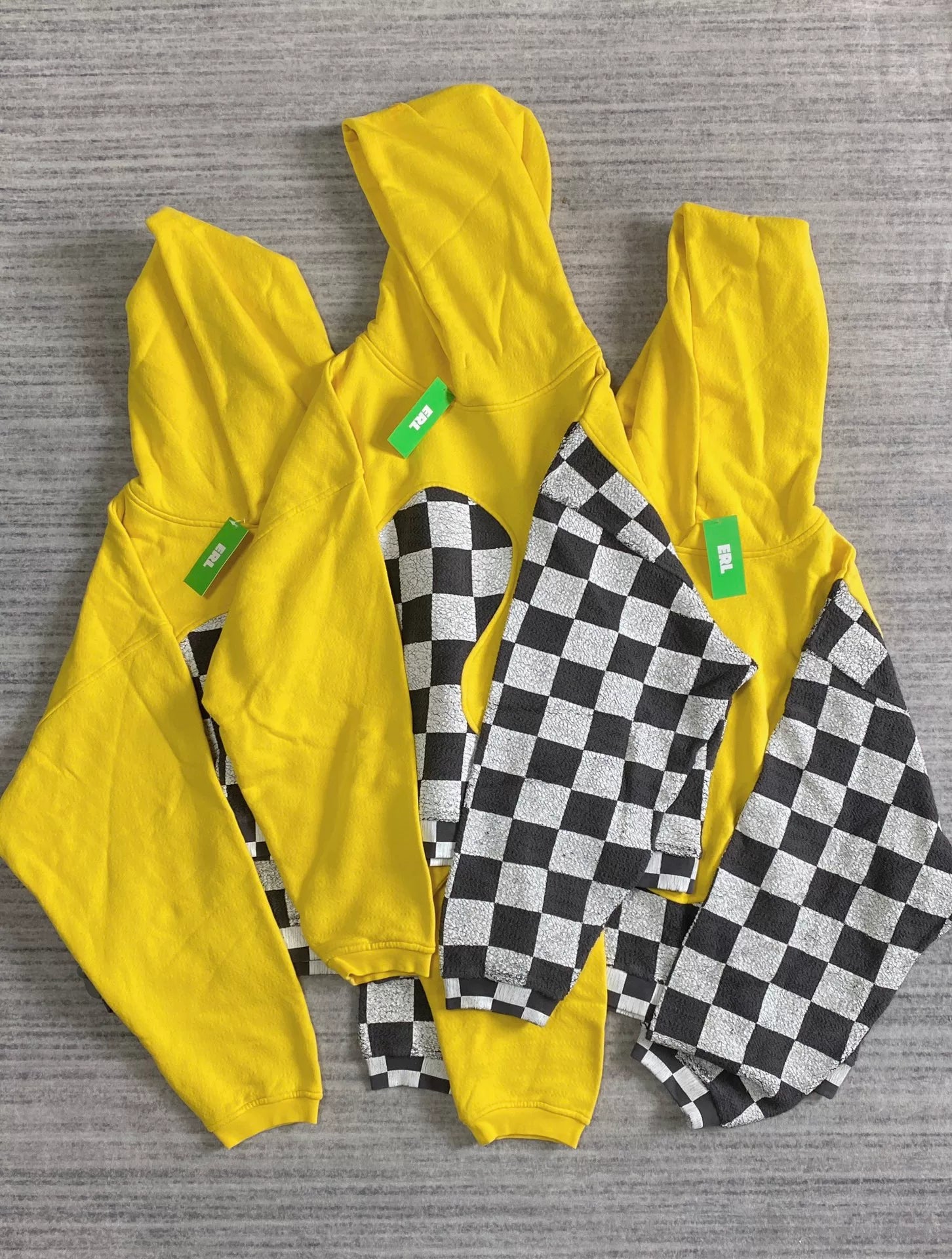 black and yellow checkerboard hooded sweatshirt