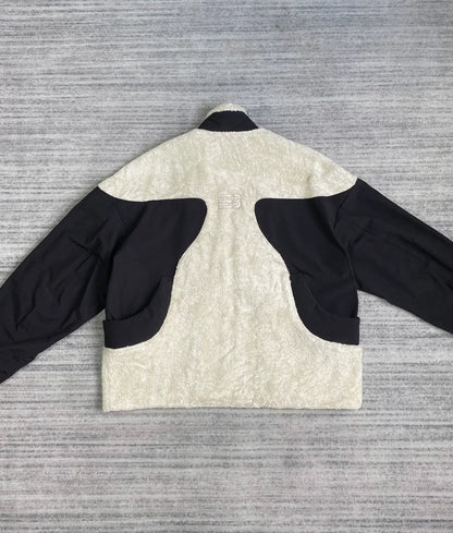 black and white fleece jacket with color blocking