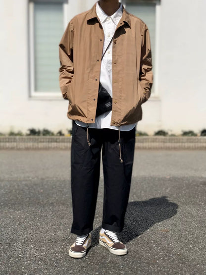 white mountaineering printed jacket