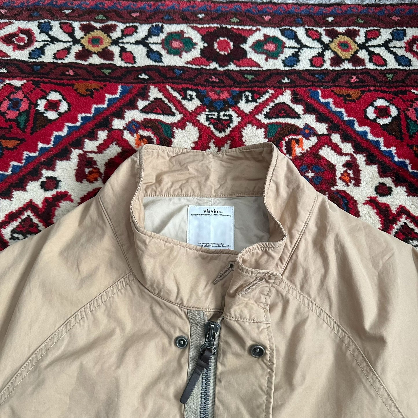 visvim m65 coat in beige color