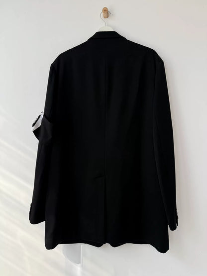 black wool suit jacket with white detail