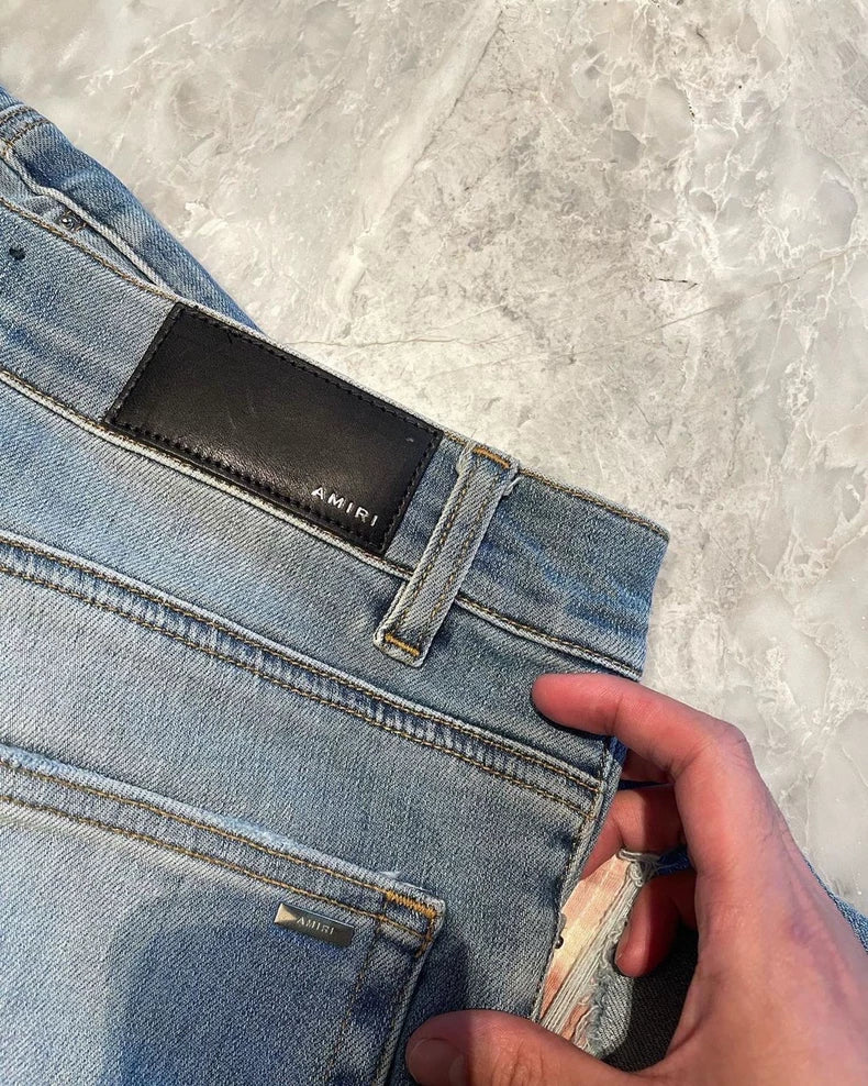 Amiri Blue Watercolor Thrash MX1 Denim Pants