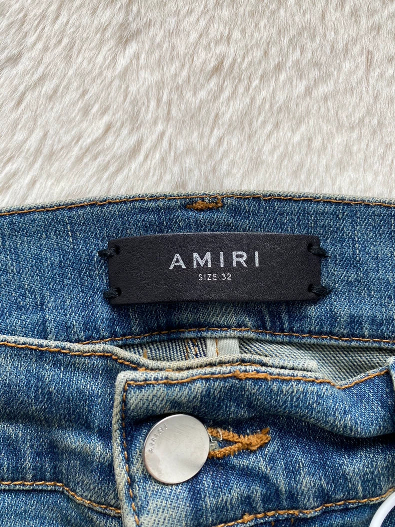 Amiri Washed Blue Leopard Print Jeans