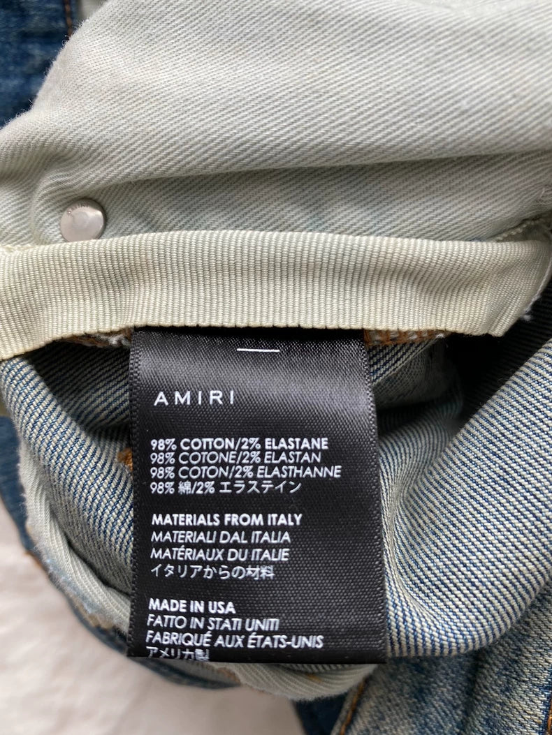 Amiri Washed Blue Leopard Print Jeans