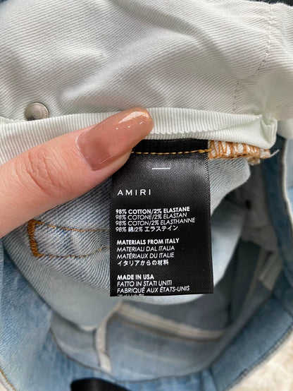 Amiri Distressed Logo Applique Denim Pants