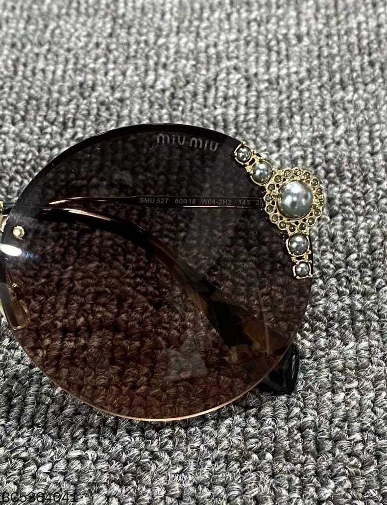 Pink Pearl Sunglasses by MIUMIU