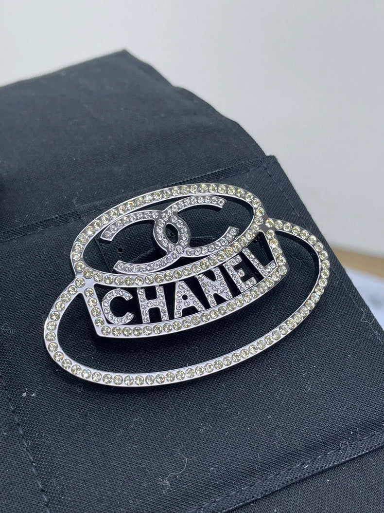 Chanel Diamond Logo Brooch