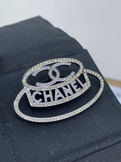 Chanel Diamond Logo Brooch