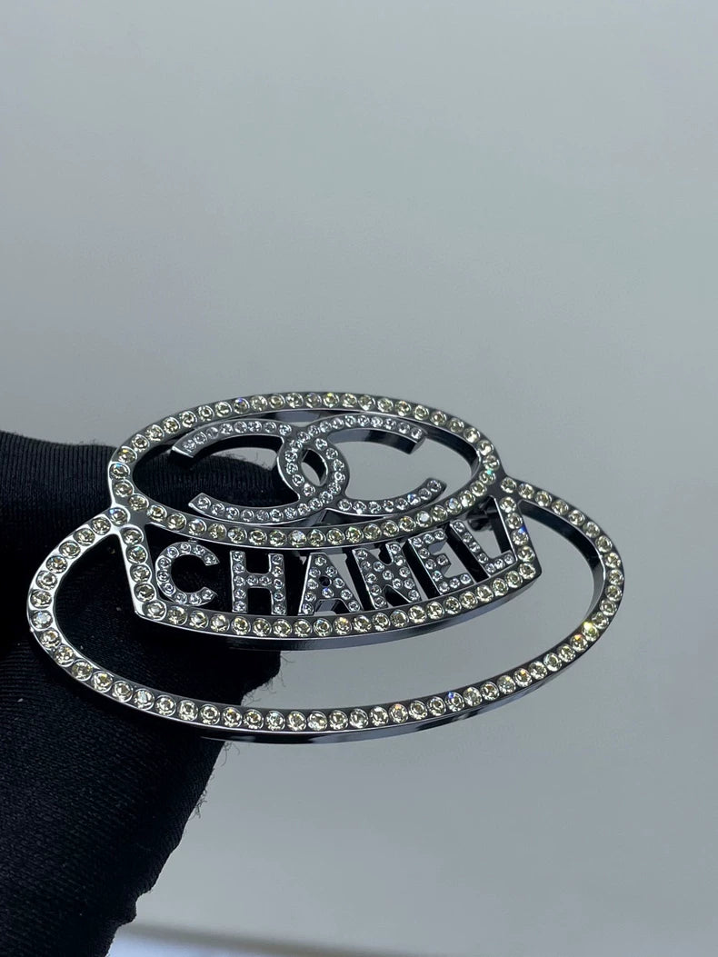 Chanel Diamond Logo Brooch