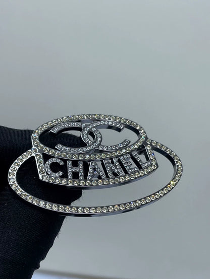 Chanel Diamond Logo Brooch