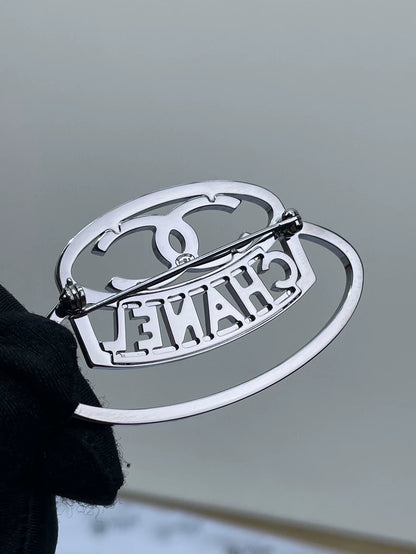 Chanel Diamond Logo Brooch