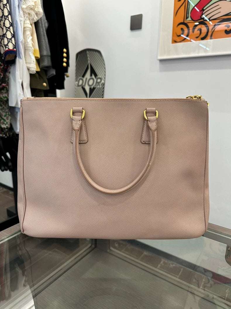 Prada Pink Handbag with Gold Accents