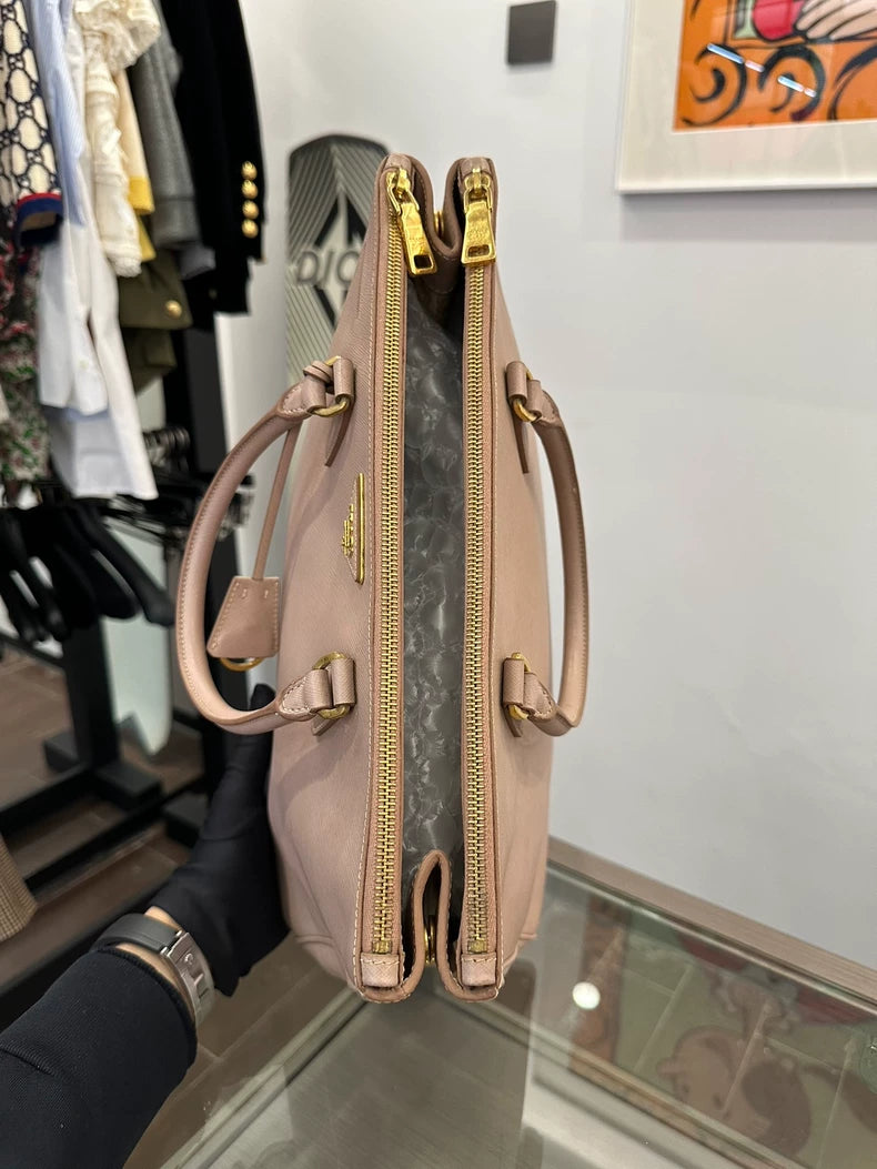 Prada Pink Handbag with Gold Accents
