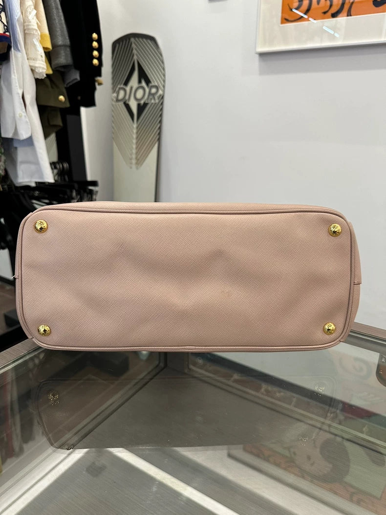 Prada Pink Handbag with Gold Accents