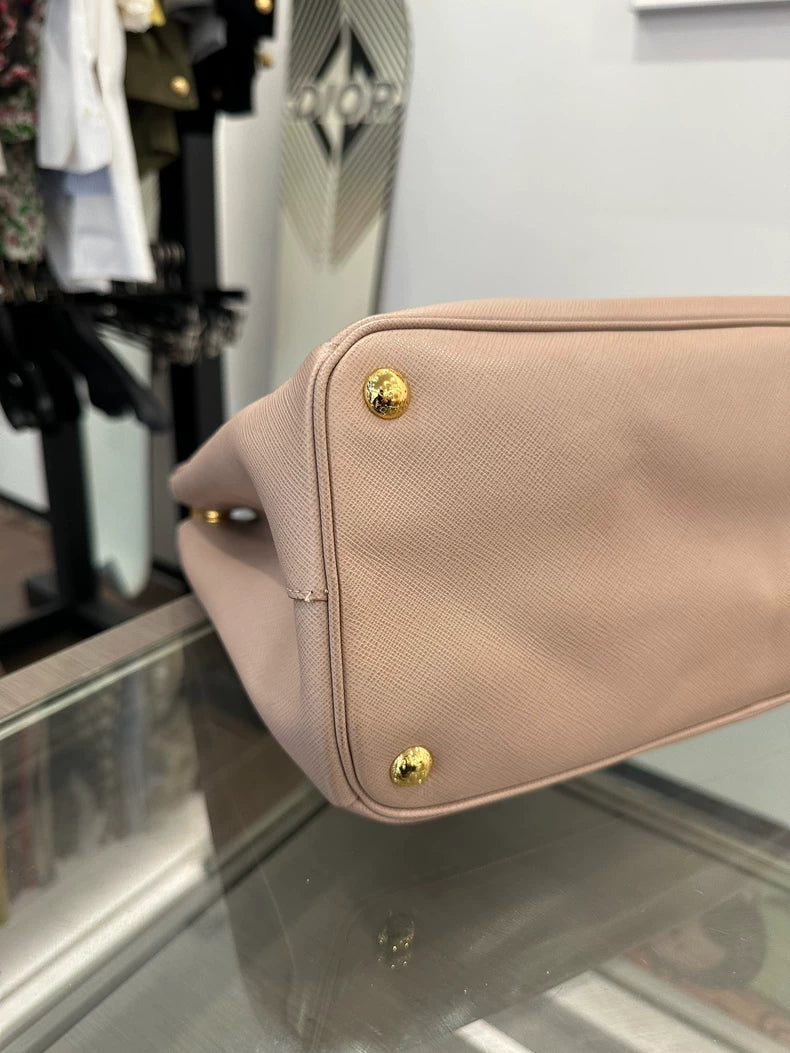 Prada Pink Handbag with Gold Accents