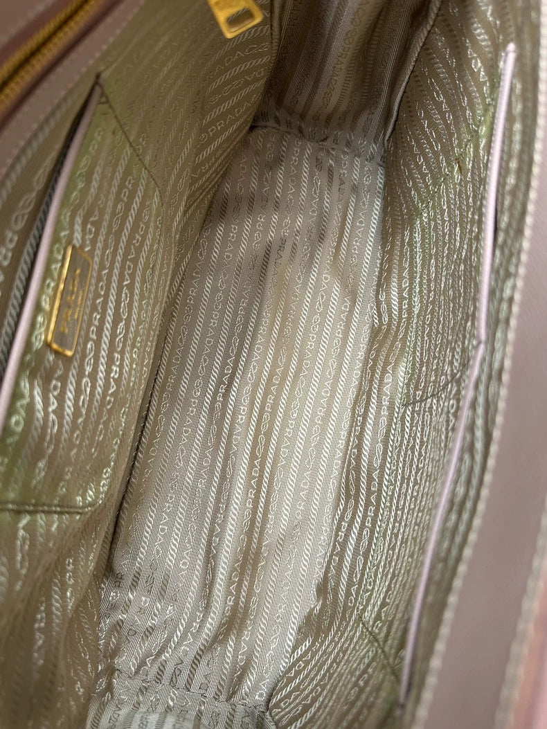 Prada Pink Handbag with Gold Accents