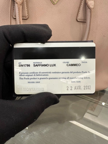 Prada Pink Handbag with Gold Accents