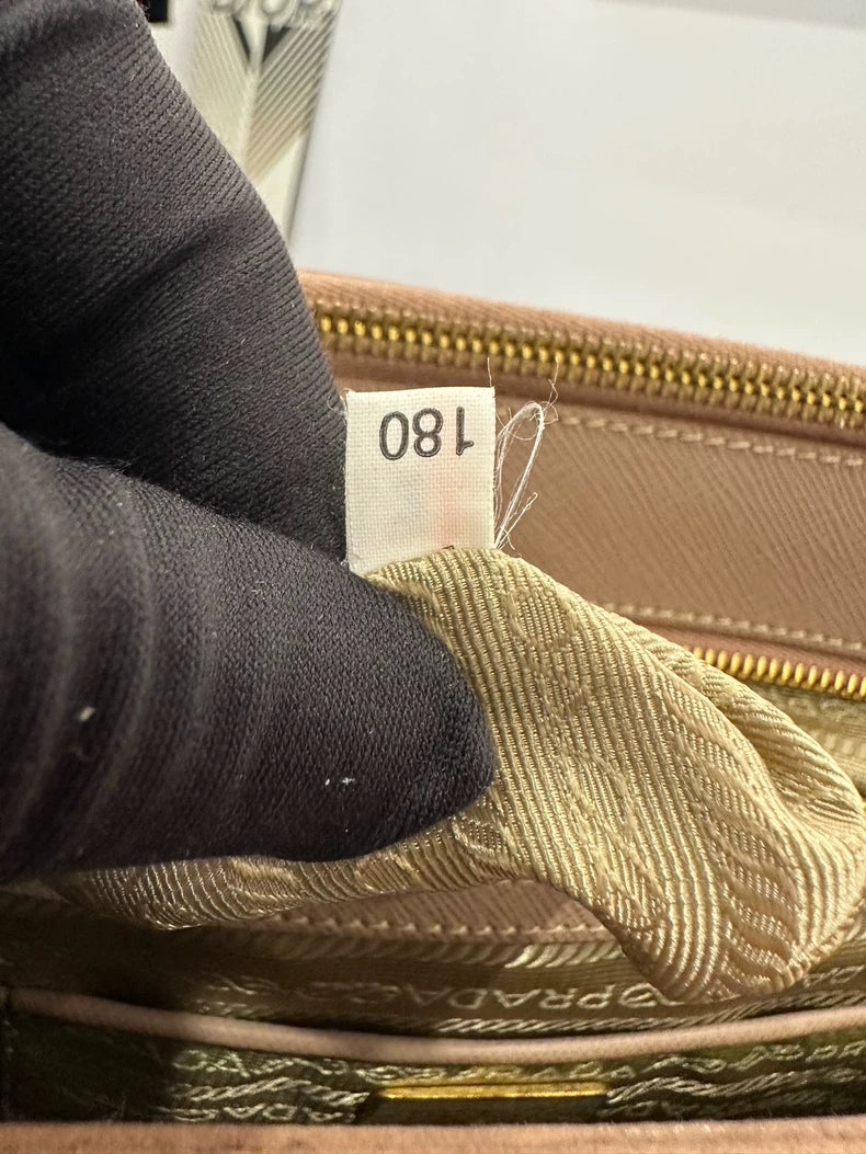 Prada Pink Handbag with Gold Accents