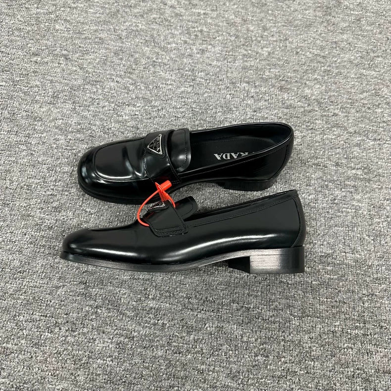 Prada Triangle Loafers in Black