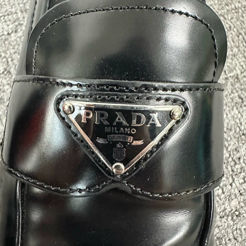 Prada Triangle Loafers in Black