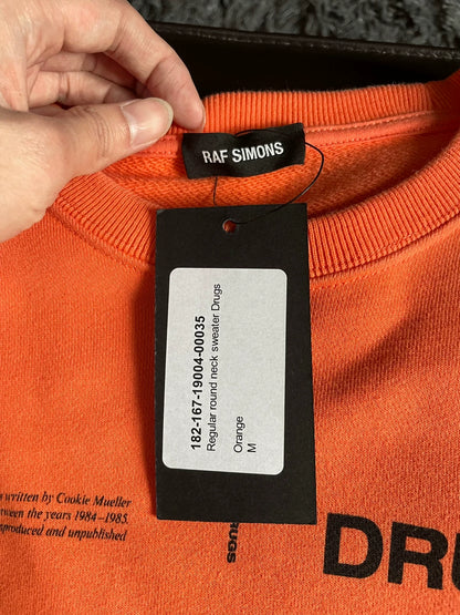 Raf Simons Slogan orange sweater