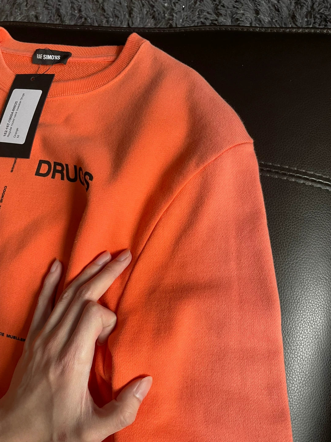 Raf Simons Slogan orange sweater