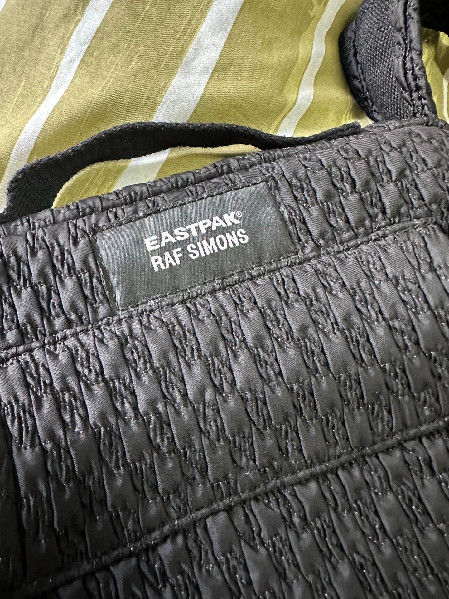 Raf Simons Eastpak co-branded hoop woven purse