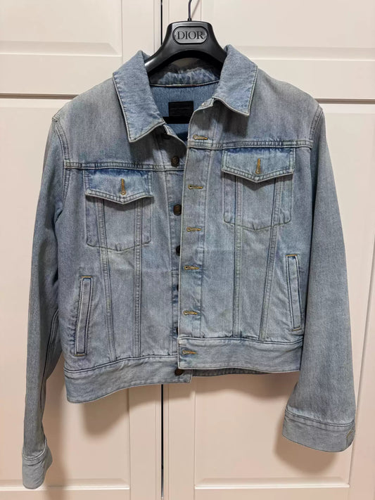 Saint laurent, make an old denim jacket with oil stains.