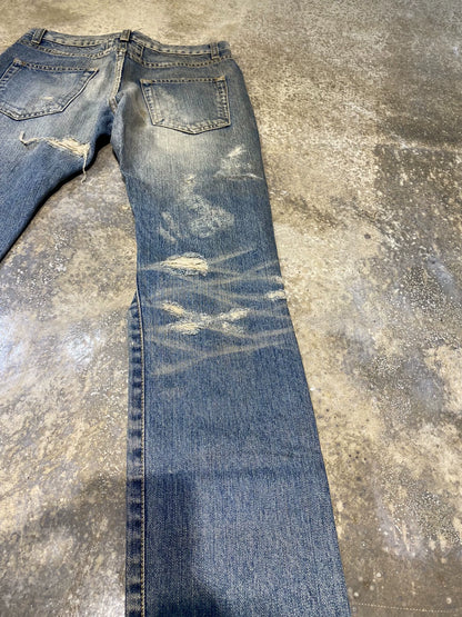 Saint Laurent Paris 13fw washed denim jeans with significant damage