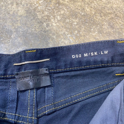 Saint Laurent Paris Washing heavily damages oily jeans