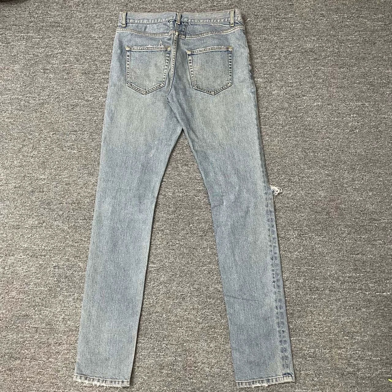 Saint Laurent Paris Blue ripped pants