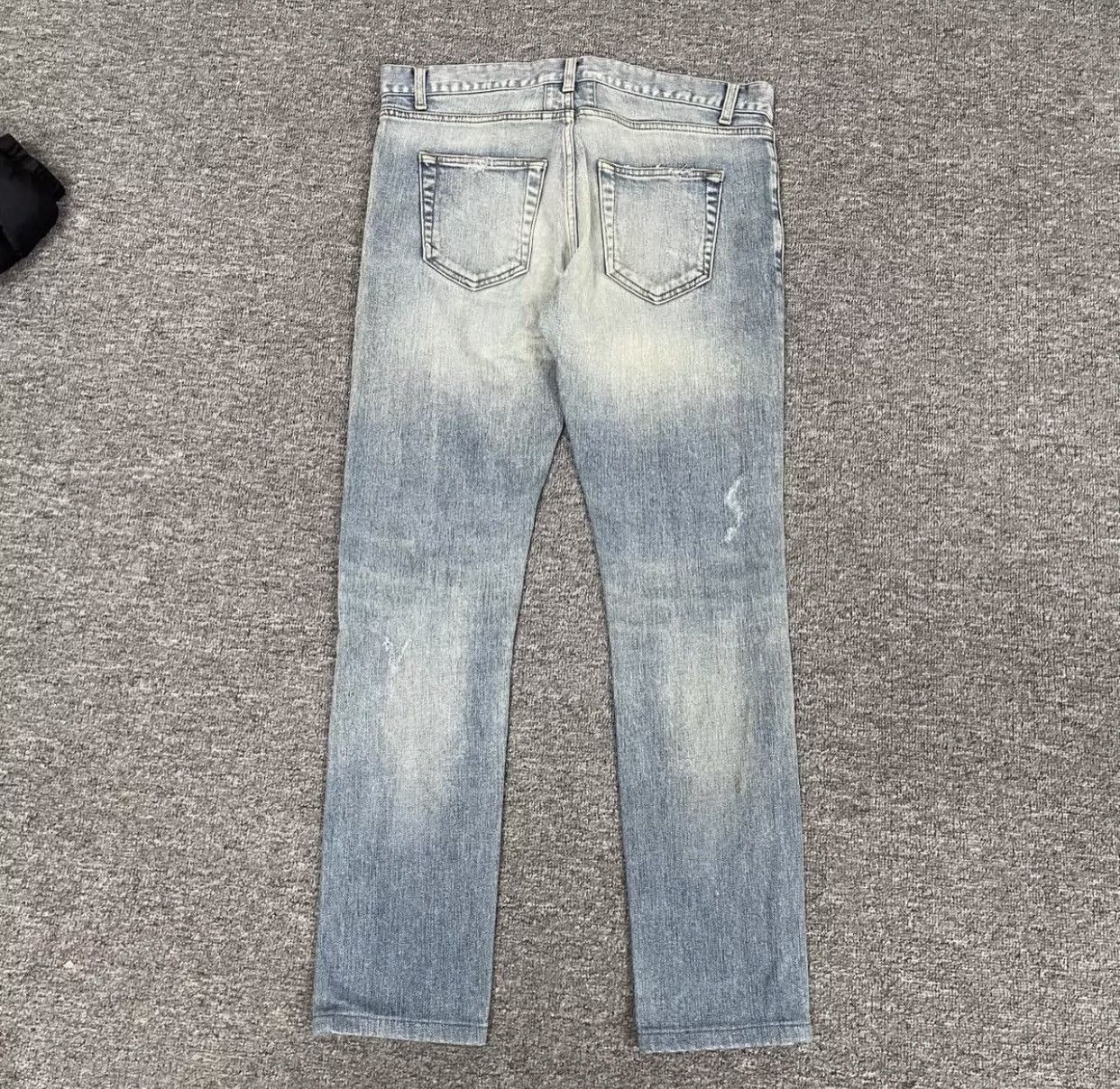 Saint Laurent washing damages jeans - DMC