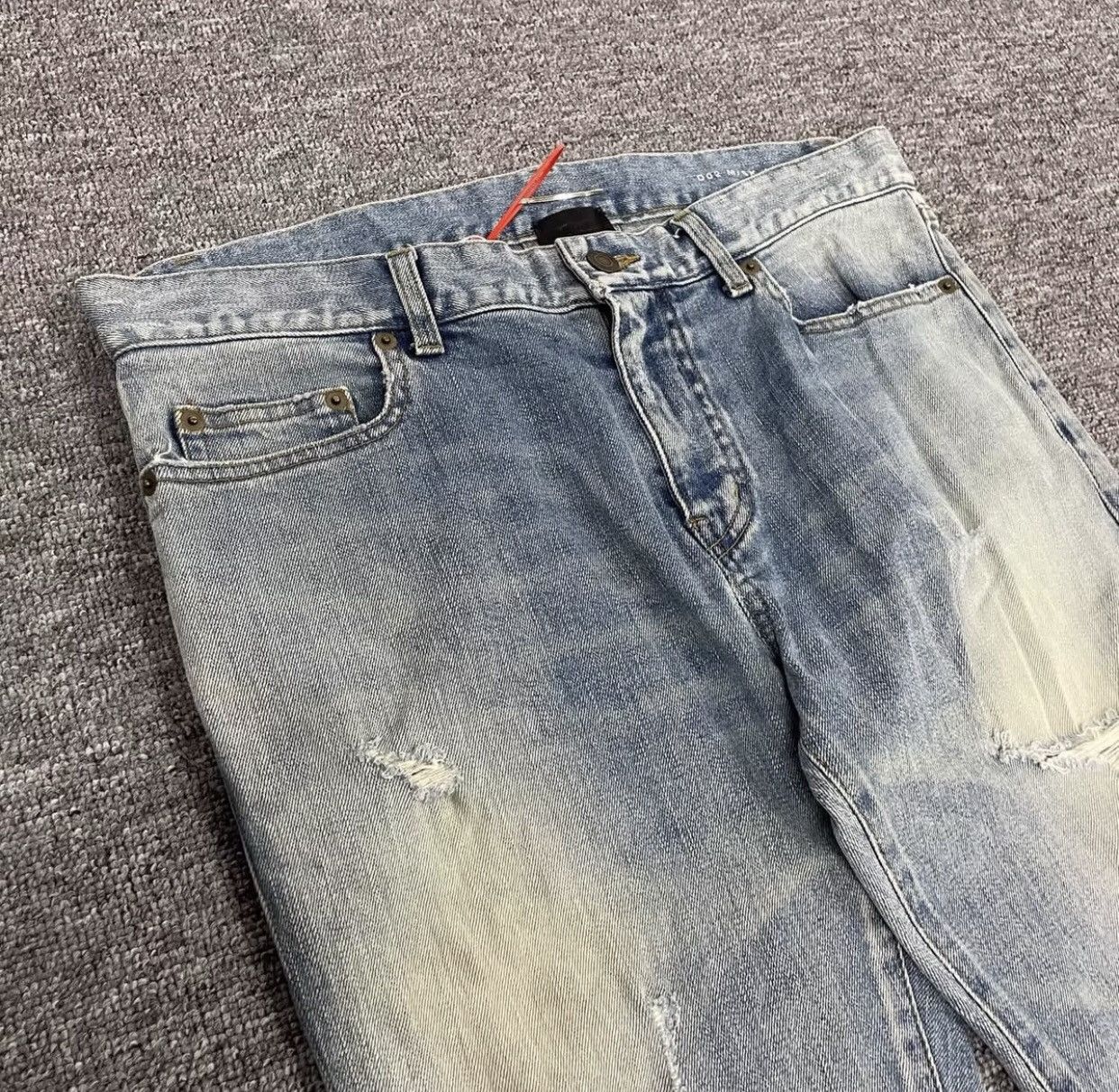 Saint Laurent washing damages jeans - DMC