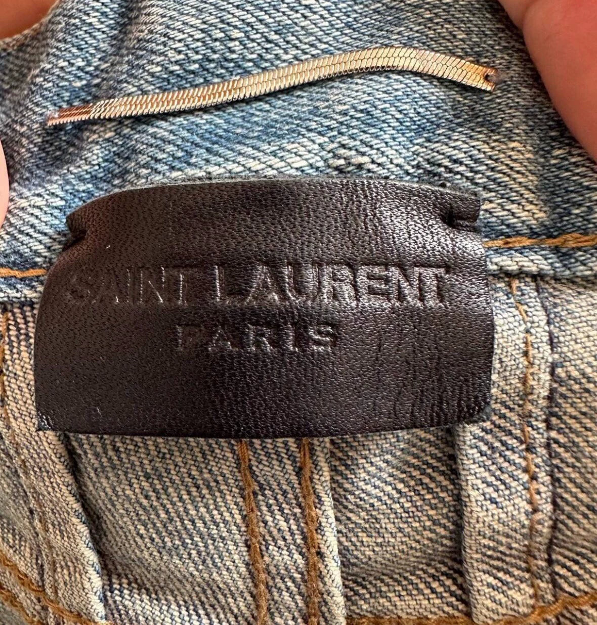 Saint Laurent Paris Ripped casual button slim fit jeans