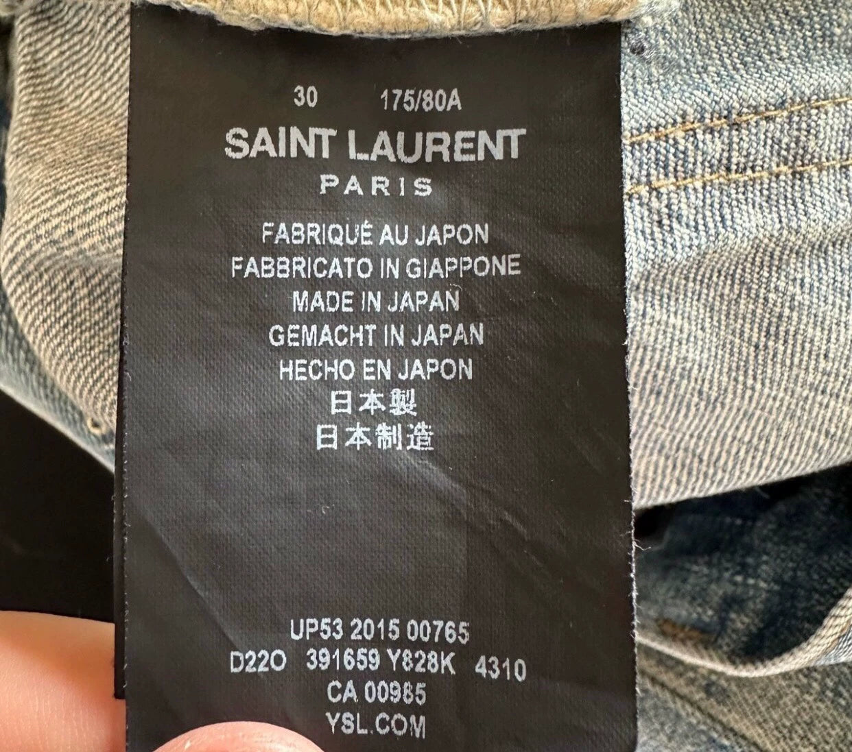 Saint Laurent Paris Ripped casual button slim fit jeans