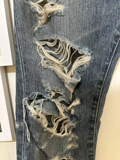 Saint Laurent Paris In the 13th year, the cat's beard was washed away and eroded, causing great damage to jeans