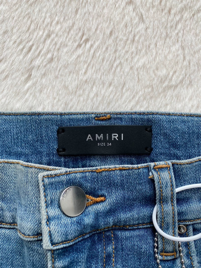 Amiri Distressed Thrasher Denim Pants