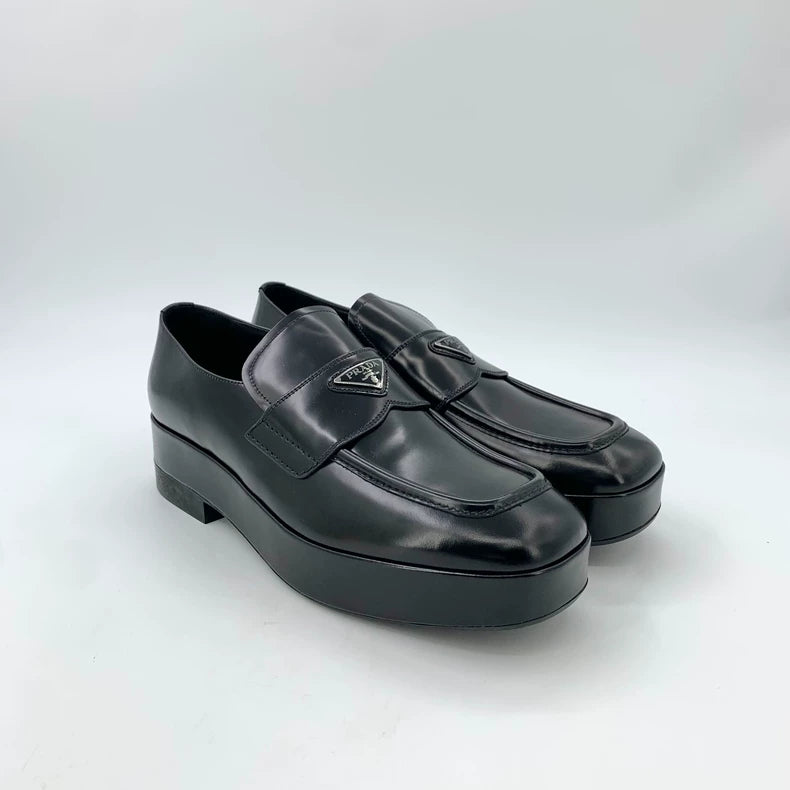 Black Leather Platform Loafers by Prada