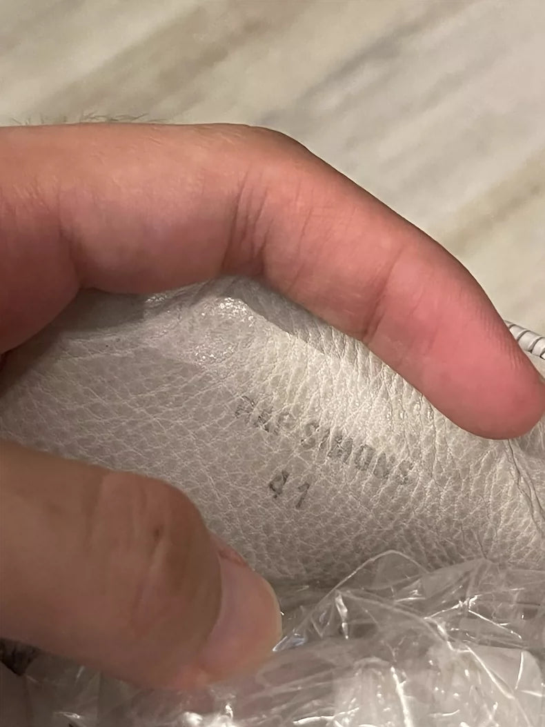 Raf Simons High-Top Sneakers with Unique Design