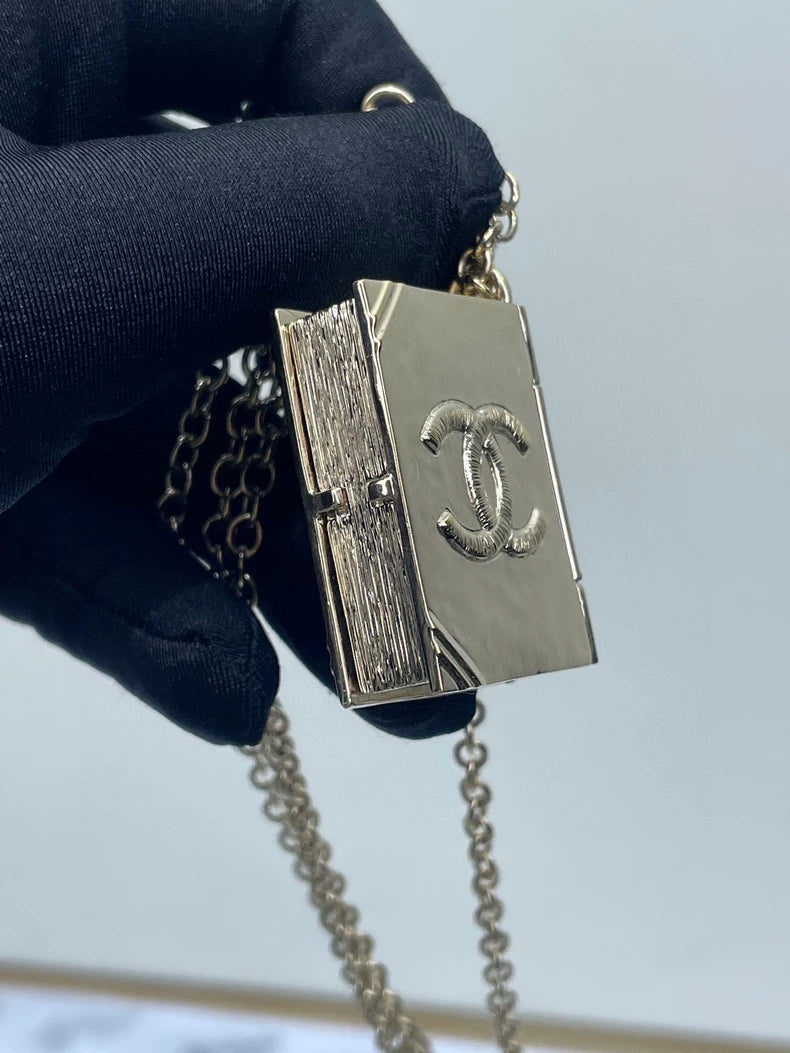 Chanel Zodiac Magic Book Necklace