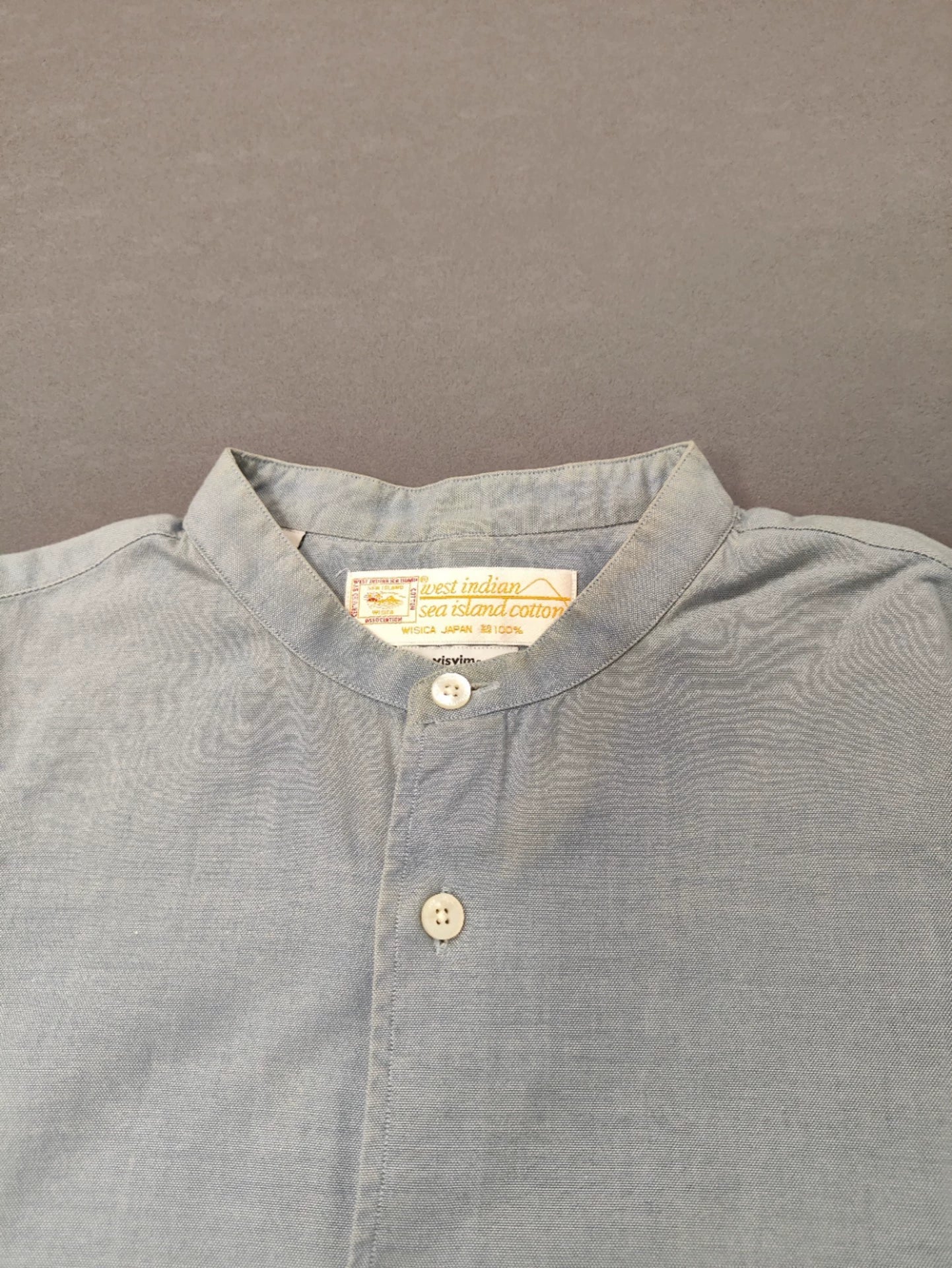 Visvim vv Small flower light blue West Indian Sea Island cotton collarless line-neck shirt