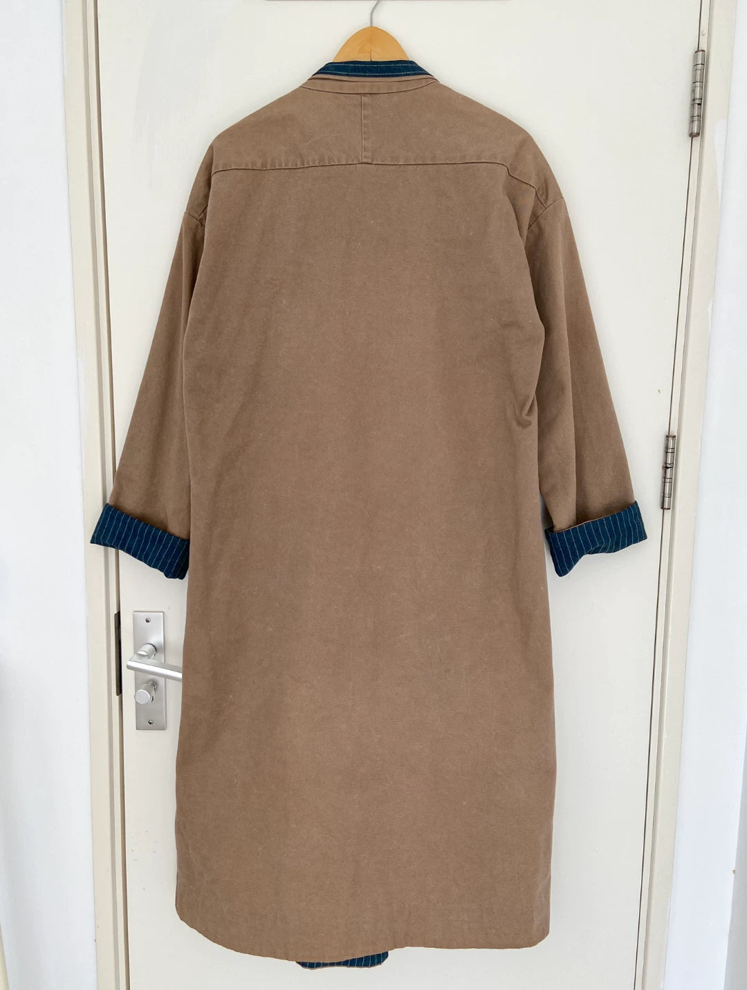 VISVIM ROBE looks like a mud-dyed coat and trench coat