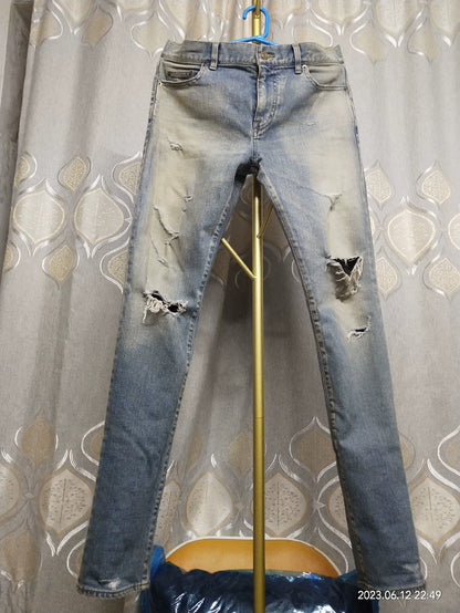 Saint Laurent Distressed Denim Jeans