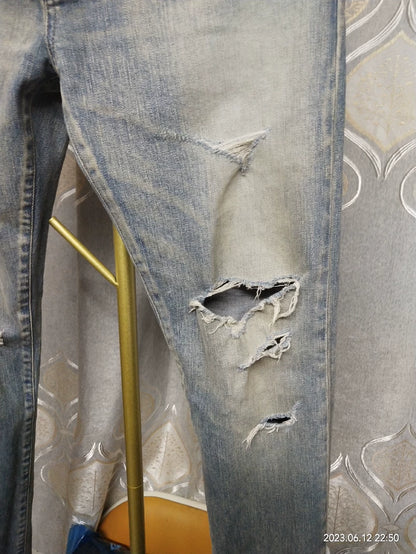 Saint Laurent Distressed Denim Jeans