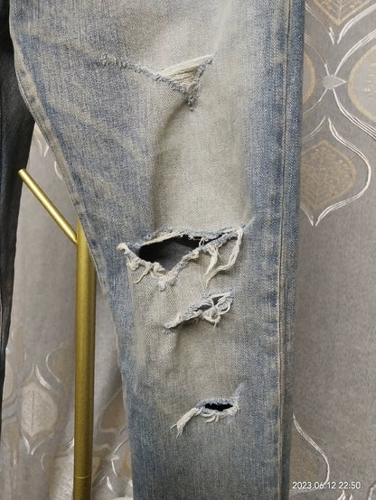 Saint Laurent Distressed Denim Jeans