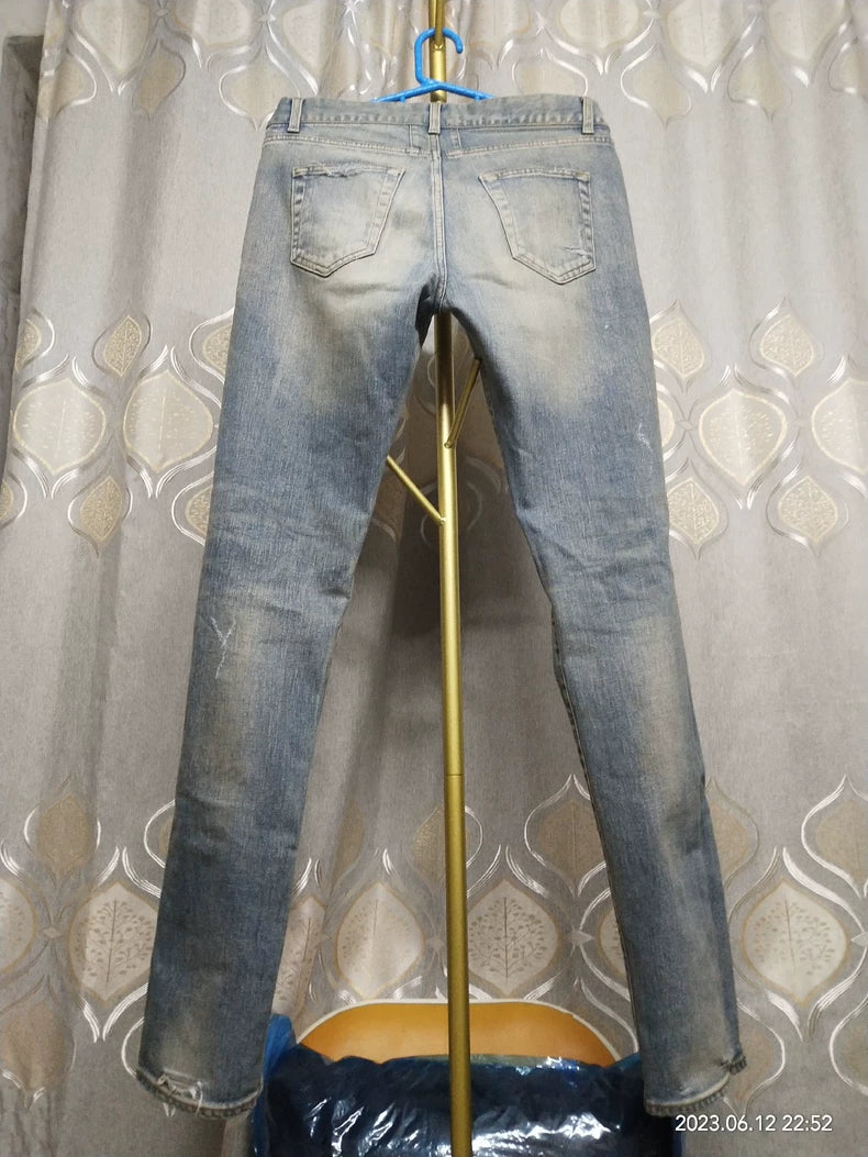 Saint Laurent Distressed Denim Jeans