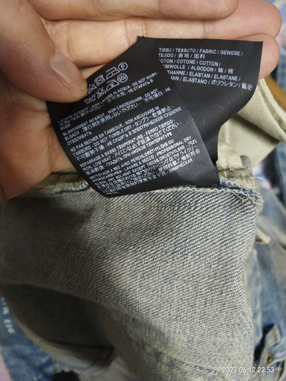 Saint Laurent Distressed Denim Jeans