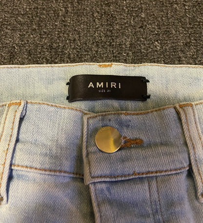 Amiri Distressed Light Wash Jeans-yf