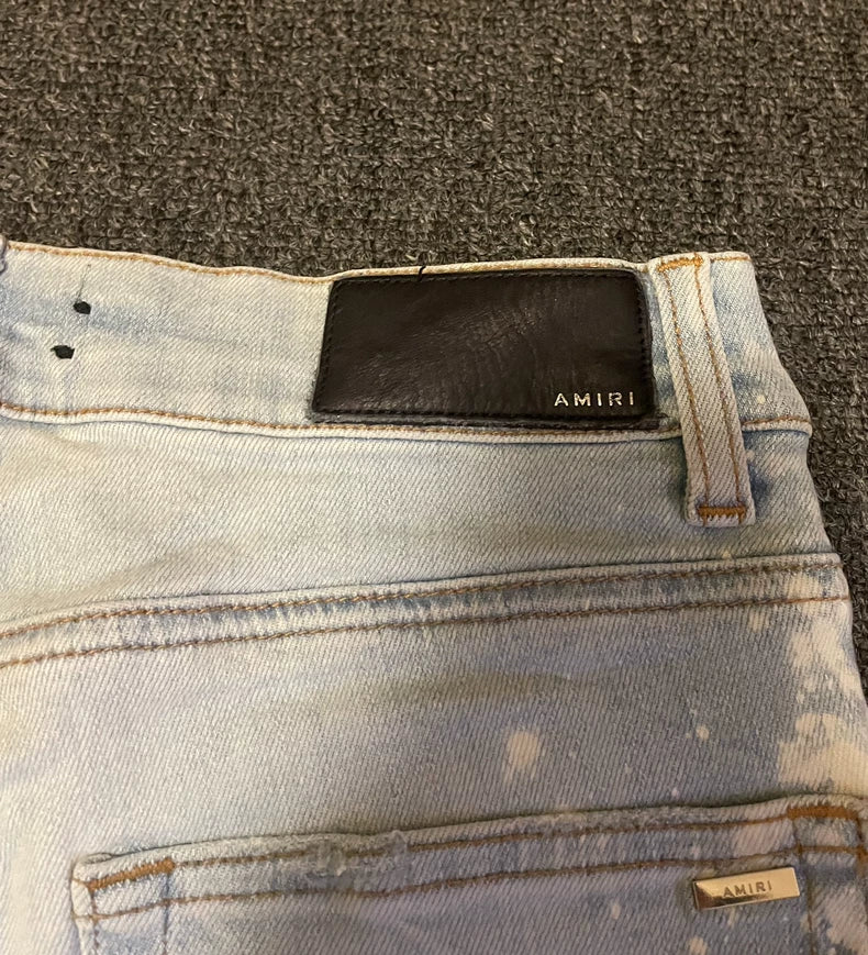 Amiri Distressed Light Wash Jeans-yf