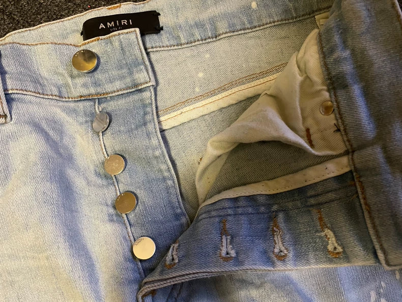 Amiri Distressed Light Wash Jeans-yf